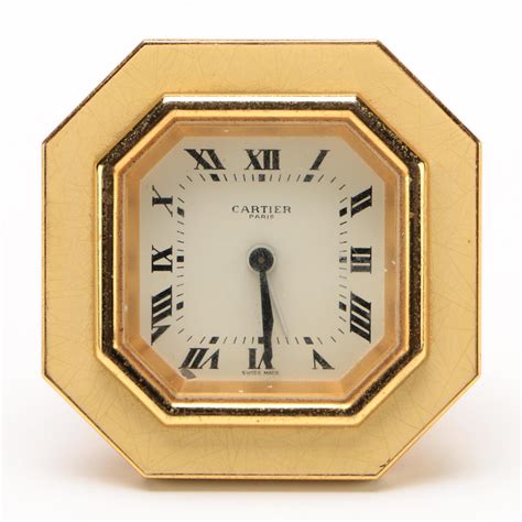 cartier desk clock warranty.